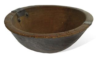 SLAVE CULTURE. Antique American burl bowl, incised with African “Adinka” designs along the lip.